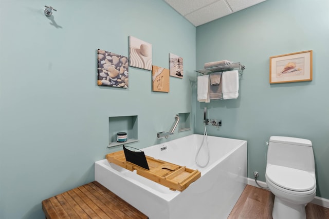 116 Dorothy Ln, Pickens, SC 29671 - bathroom with a freestanding tub, a paneled ceiling, and wood finished floors