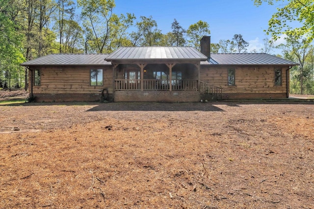101 Owens Dr, Inman, SC 29349 - chalet / cabin featuring a chimney, a porch, and a metal roof