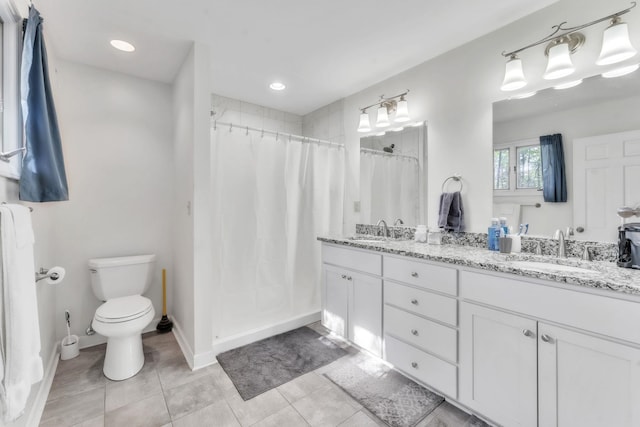 101 Owens Dr, Inman, SC 29349 - bathroom with double vanity, tile patterned floors, curtained shower, and recessed lighting
