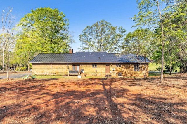 101 Owens Dr, Inman, SC 29349 - back of property featuring a chimney and a metal roof