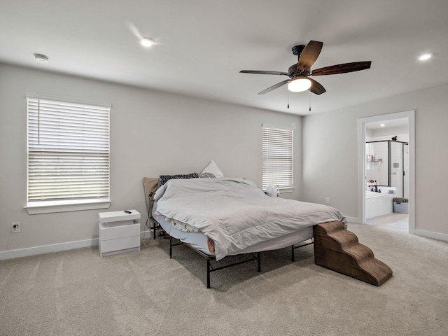 1848 Sourwood Dr, Woodruff, SC 29388 - bedroom with light carpet, multiple windows, connected bathroom, recessed lighting, and ceiling fan