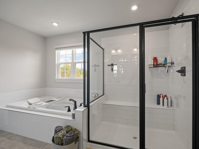 1848 Sourwood Dr, Woodruff, SC 29388 - bathroom with a bath, a stall shower, recessed lighting, and tile patterned floors