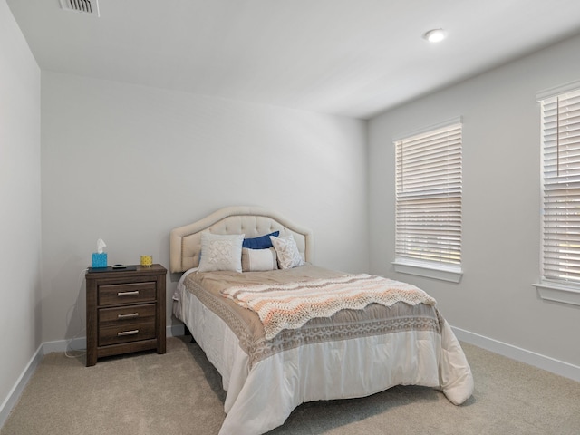 1848 Sourwood Dr, Woodruff, SC 29388 - carpeted bedroom featuring multiple windows