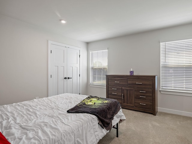 1848 Sourwood Dr, Woodruff, SC 29388 - bedroom with light colored carpet and a closet