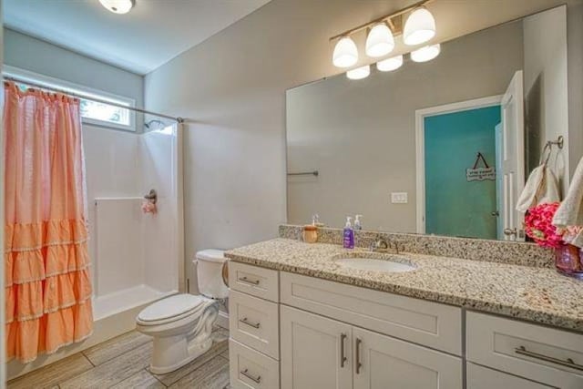 217 Aqua Cove Ct, Inman, SC 29349 - bathroom with vanity, a shower with curtain, and wood finished floors