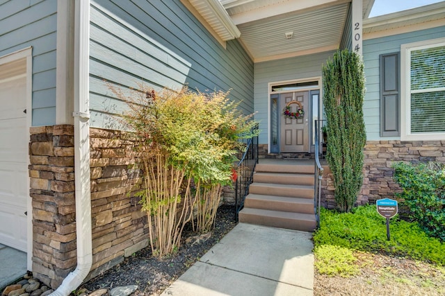 204 Lord Byron Ln, Travelers Rest, SC 29690 - view of exterior entry featuring a garage