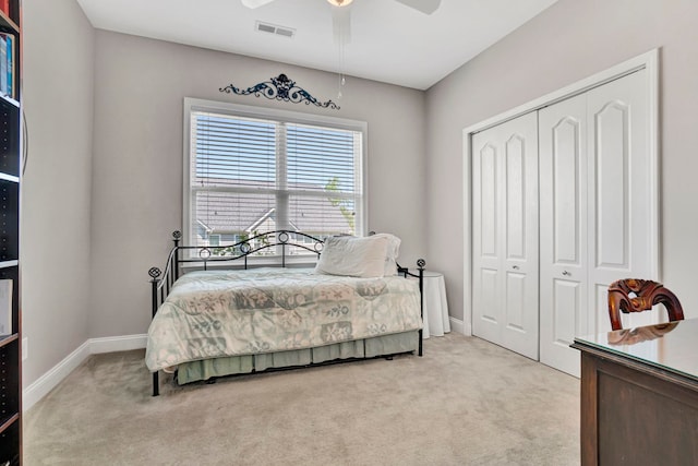 204 Lord Byron Ln, Travelers Rest, SC 29690 - bedroom with light colored carpet, a closet, and ceiling fan