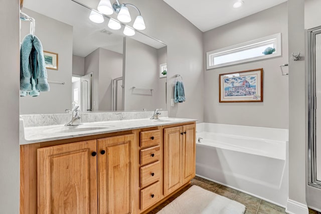 204 Lord Byron Ln, Travelers Rest, SC 29690 - full bathroom featuring a bath, double vanity, a stall shower, and tile patterned floors