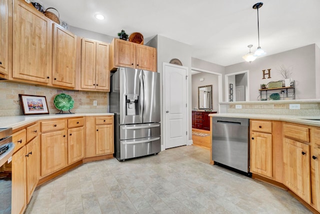204 Lord Byron Ln, Travelers Rest, SC 29690 - kitchen featuring stainless steel appliances, light brown cabinets, light countertops, and tasteful backsplash