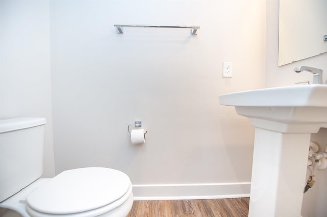 521 Preakness Run, Spartanburg, SC 29301 - half bathroom featuring toilet and wood finished floors