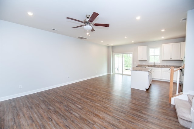521 Preakness Run, Spartanburg, SC 29301 - unfurnished living room featuring dark wood-style flooring, recessed lighting, a ceiling fan, and stairway