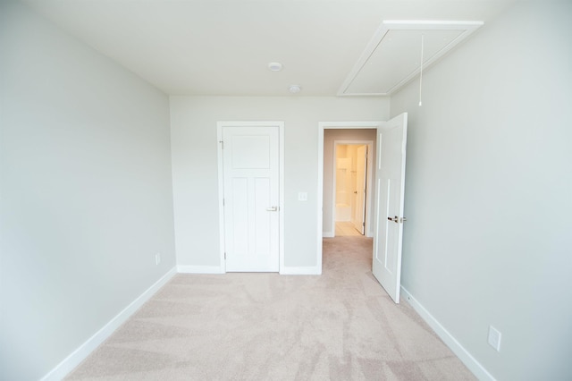 521 Preakness Run, Spartanburg, SC 29301 - unfurnished bedroom featuring attic access and light colored carpet