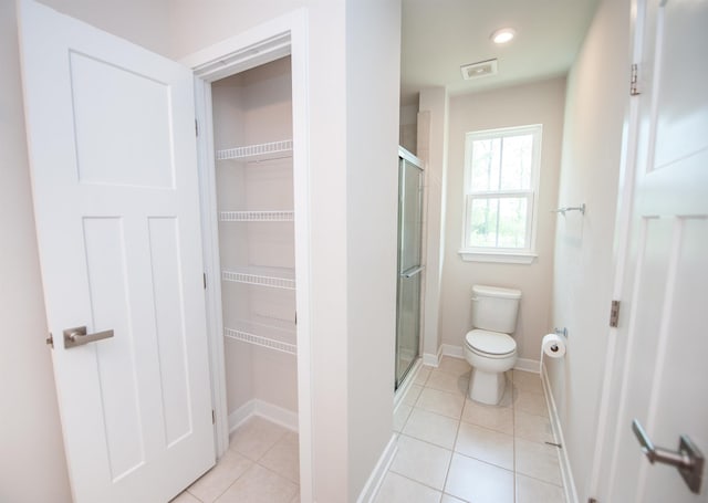 521 Preakness Run, Spartanburg, SC 29301 - bathroom with a shower stall, tile patterned floors, a spacious closet, and recessed lighting