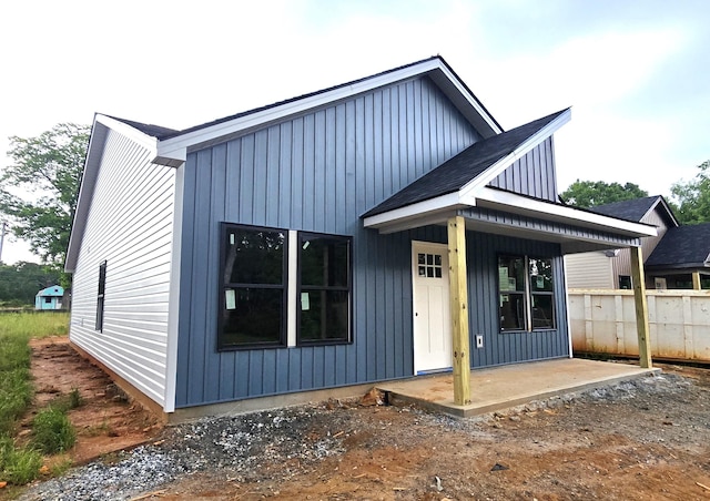 2314 Wellington Rd, Spartanburg, SC 29302 - back of house with board and batten siding and a porch