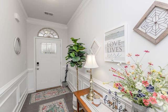 5 Yellow Fox Rd, Greer, SC 29650 - foyer featuring ornamental molding, dark wood-style floors, a wainscoted wall, and a decorative wall