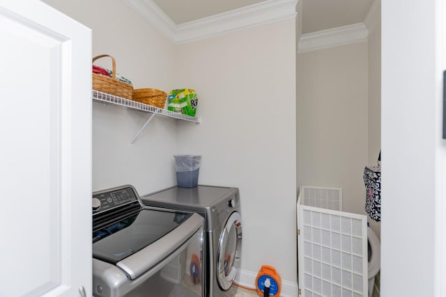 5 Yellow Fox Rd, Greer, SC 29650 - laundry room with washing machine and dryer and crown molding