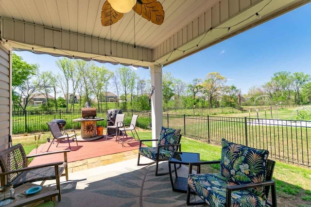 5 Yellow Fox Rd, Greer, SC 29650 - fenced backyard featuring a wooden deck and ceiling fan
