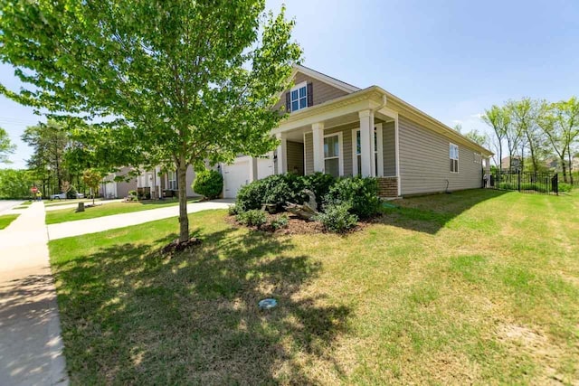 5 Yellow Fox Rd, Greer, SC 29650 - view of home's exterior featuring driveway, a porch, brick siding, and an attached garage