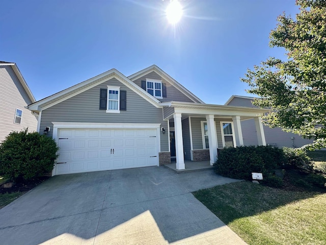 5 Yellow Fox Rd, Greer, SC 29650 - view of front facade with a porch, concrete driveway, and a garage