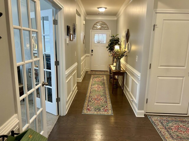 5 Yellow Fox Rd, Greer, SC 29650 - entrance foyer featuring a decorative wall, crown molding, dark wood-style floors, and a wainscoted wall