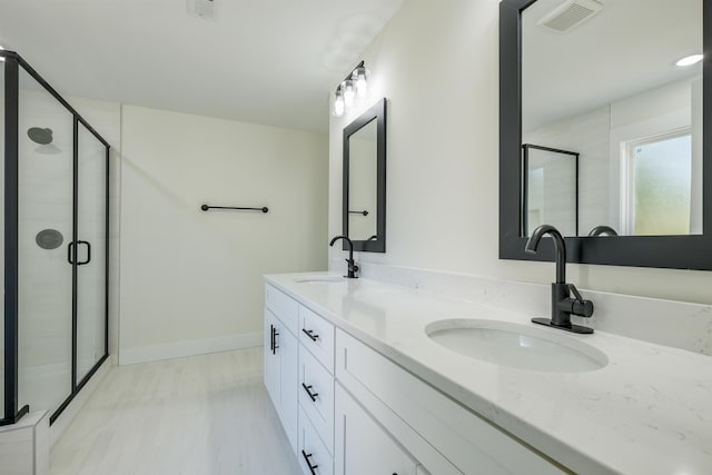 7 Campbell Mill Rd, Traveleres Rest, SC 29690 - bathroom with double vanity and a shower stall