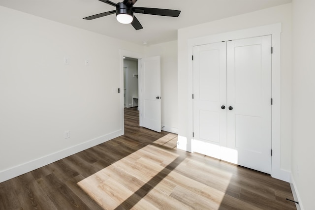 7 Campbell Mill Rd, Traveleres Rest, SC 29690 - unfurnished bedroom featuring wood finished floors, a closet, and a ceiling fan