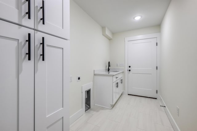 7 Campbell Mill Rd, Traveleres Rest, SC 29690 - laundry area featuring electric dryer hookup, cabinet space, and recessed lighting