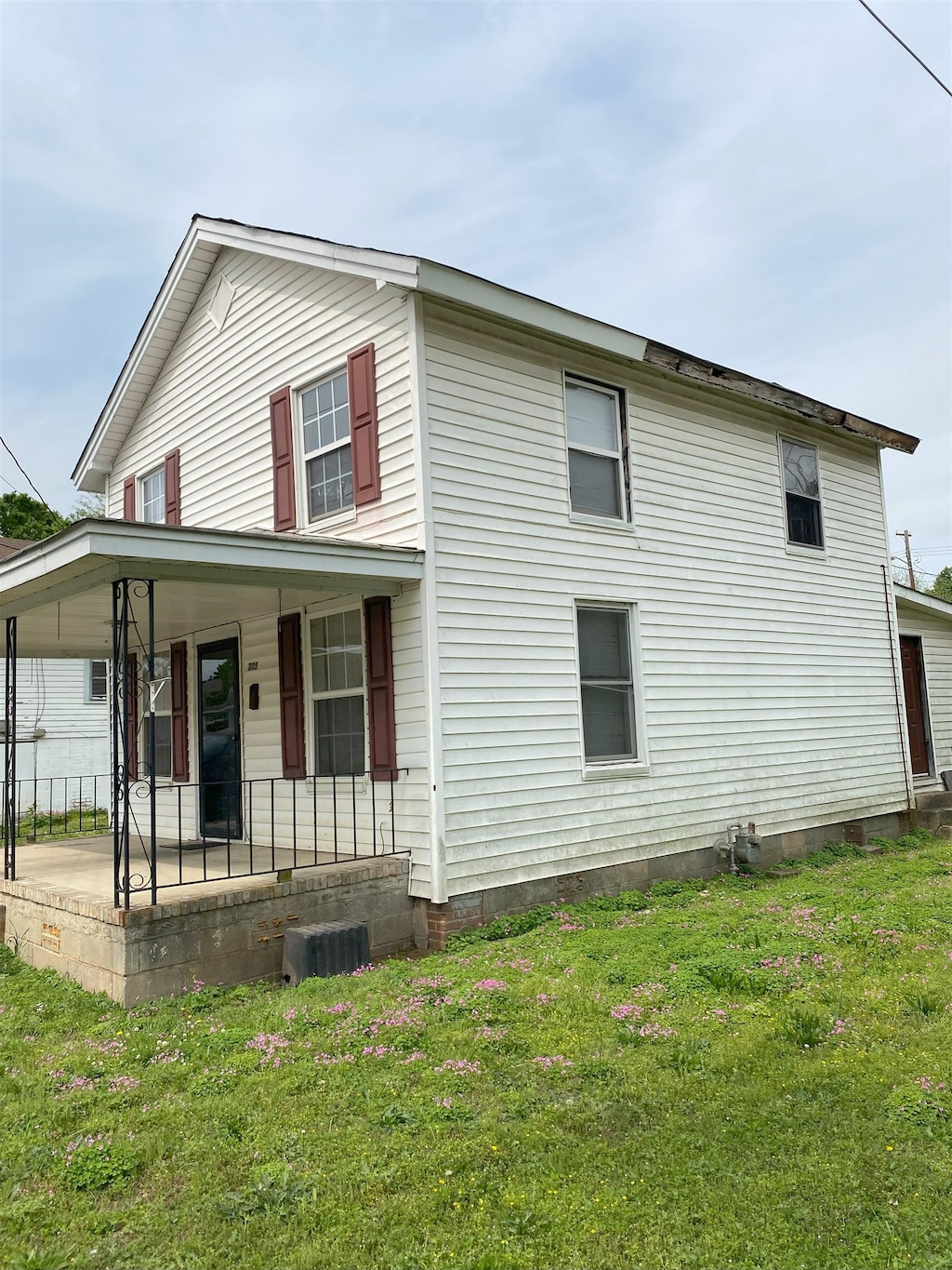 205 Hicks St, Union, SC 29379 - view of home's exterior with covered porch and a yard