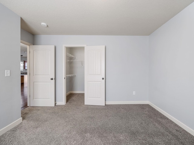 311 Hayfield Ct, Boiling Springs, SC 29316 - unfurnished bedroom with carpet flooring, a spacious closet, and a closet