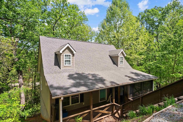 419 Hidden Hill Rd, Tryon, NC 28782 - view of front of house with a sunroom and a shingled roof