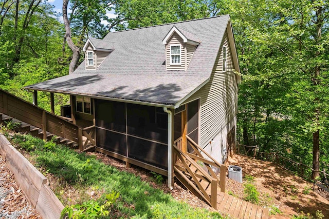 419 Hidden Hill Rd, Tryon, NC 28782 - view of side of home with a sunroom and roof with shingles
