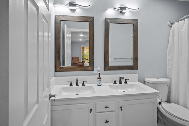 419 Hidden Hill Rd, Tryon, NC 28782 - bathroom featuring double vanity and a shower with shower curtain