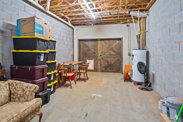 419 Hidden Hill Rd, Tryon, NC 28782 - unfinished below grade area with water heater and concrete block wall