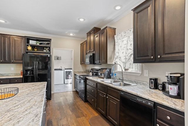 140 Vera Ln, Columbus, NC 28722 - kitchen featuring black appliances, washer and dryer, dark brown cabinetry, crown molding, and dark wood-type flooring