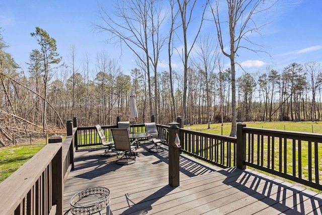 140 Vera Ln, Columbus, NC 28722 - wooden terrace featuring outdoor dining space and a yard