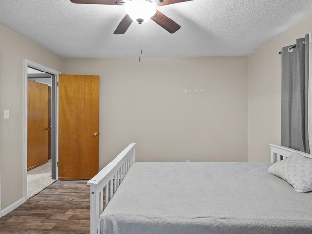 228 Anita Dr, Spartanburg, SC 29302 - bedroom featuring wood finished floors, a textured ceiling, and ceiling fan