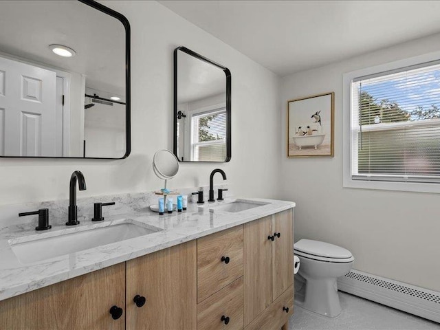 207 Bartlett St, Mauldin, SC 29662 - full bathroom featuring a baseboard heating unit and double vanity