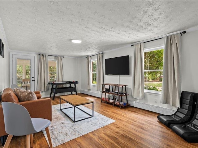 207 Bartlett St, Mauldin, SC 29662 - living room with wood finished floors and a textured ceiling