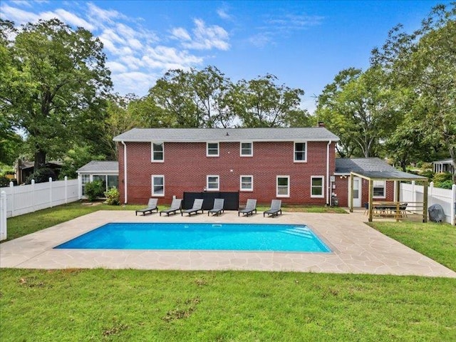 207 Bartlett St, Mauldin, SC 29662 - rear view of house featuring a patio, brick siding, and view of wooded area