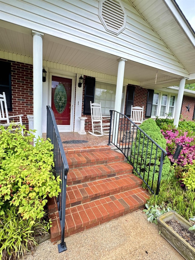 8627 Valley Falls Rd, Boiling Springs, SC 29316 - doorway to property with a porch and brick siding