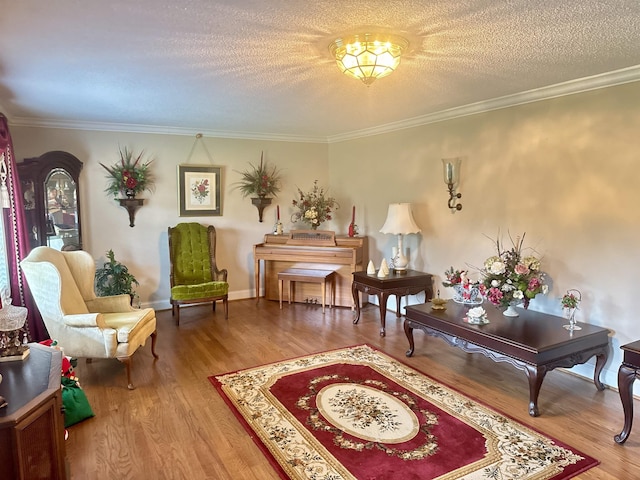 8627 Valley Falls Rd, Boiling Springs, SC 29316 - sitting room featuring wood finished floors, ornamental molding, and a textured ceiling