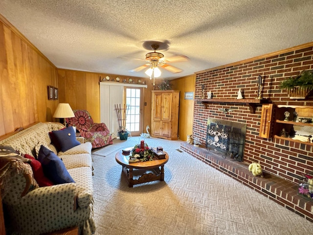 8627 Valley Falls Rd, Boiling Springs, SC 29316 - carpeted living area featuring a brick fireplace, wooden walls, ceiling fan, and a textured ceiling