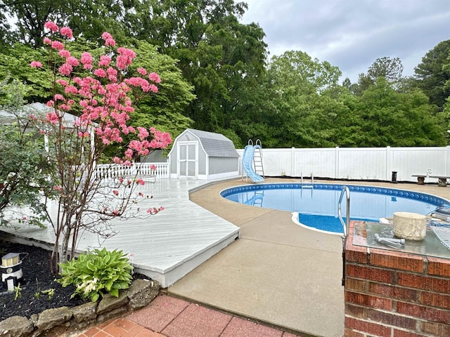8627 Valley Falls Rd, Boiling Springs, SC 29316 - view of pool with a water slide, a shed, and a deck