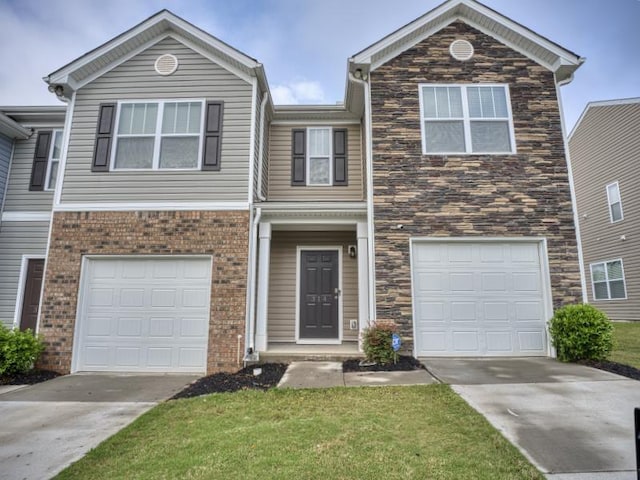 314 Sea Isle Pl, Greer, SC 29650 - view of front of home with driveway, a garage, and stone siding