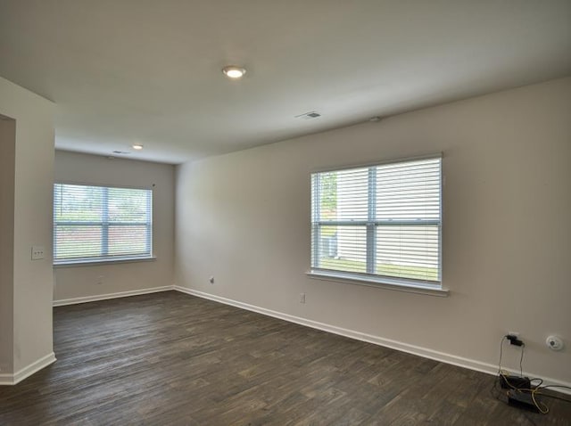 314 Sea Isle Pl, Greer, SC 29650 - empty room with plenty of natural light, dark wood-type flooring, and recessed lighting