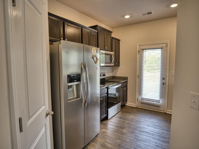 314 Sea Isle Pl, Greer, SC 29650 - kitchen featuring appliances with stainless steel finishes, dark brown cabinets, dark wood-style floors, and recessed lighting