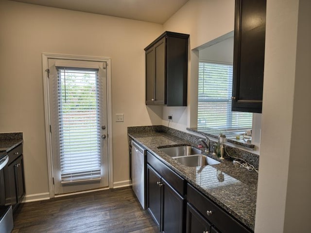 314 Sea Isle Pl, Greer, SC 29650 - kitchen featuring stainless steel dishwasher, dark stone counters, and dark wood finished floors
