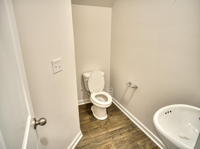314 Sea Isle Pl, Greer, SC 29650 - bathroom with toilet and wood finished floors