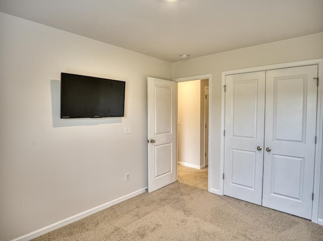 314 Sea Isle Pl, Greer, SC 29650 - unfurnished bedroom featuring light colored carpet and a closet