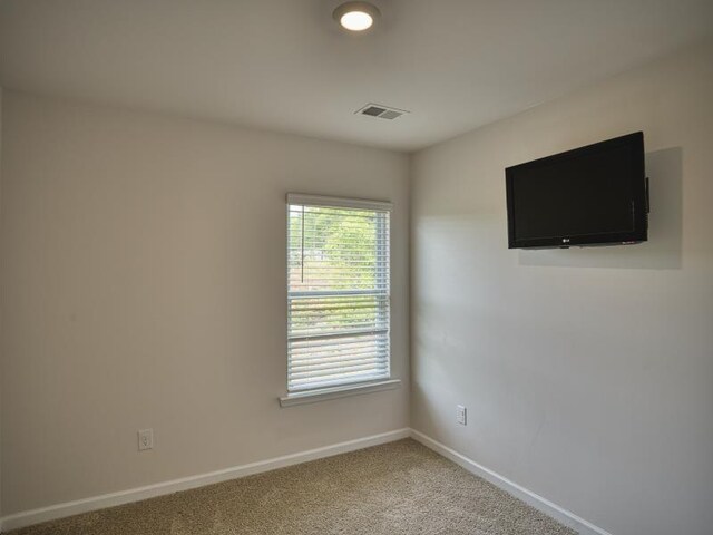 314 Sea Isle Pl, Greer, SC 29650 - empty room with baseboards and light carpet